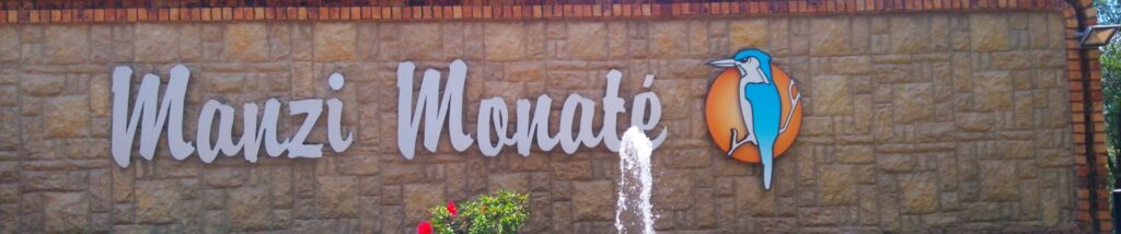 manzi monaté entrance sign